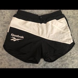 Reebok Track shorts.